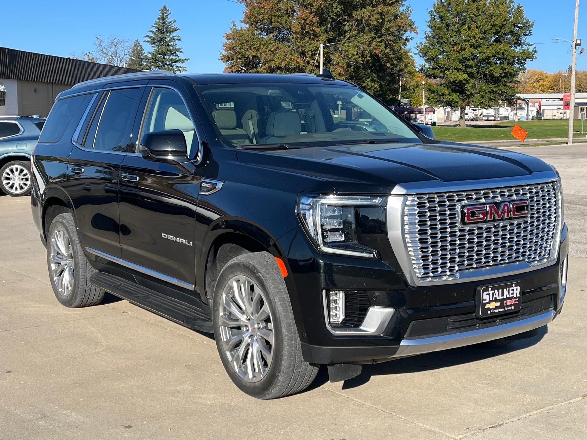 2023 GMC Yukon Denali in Onyx Black — front three-quarter view