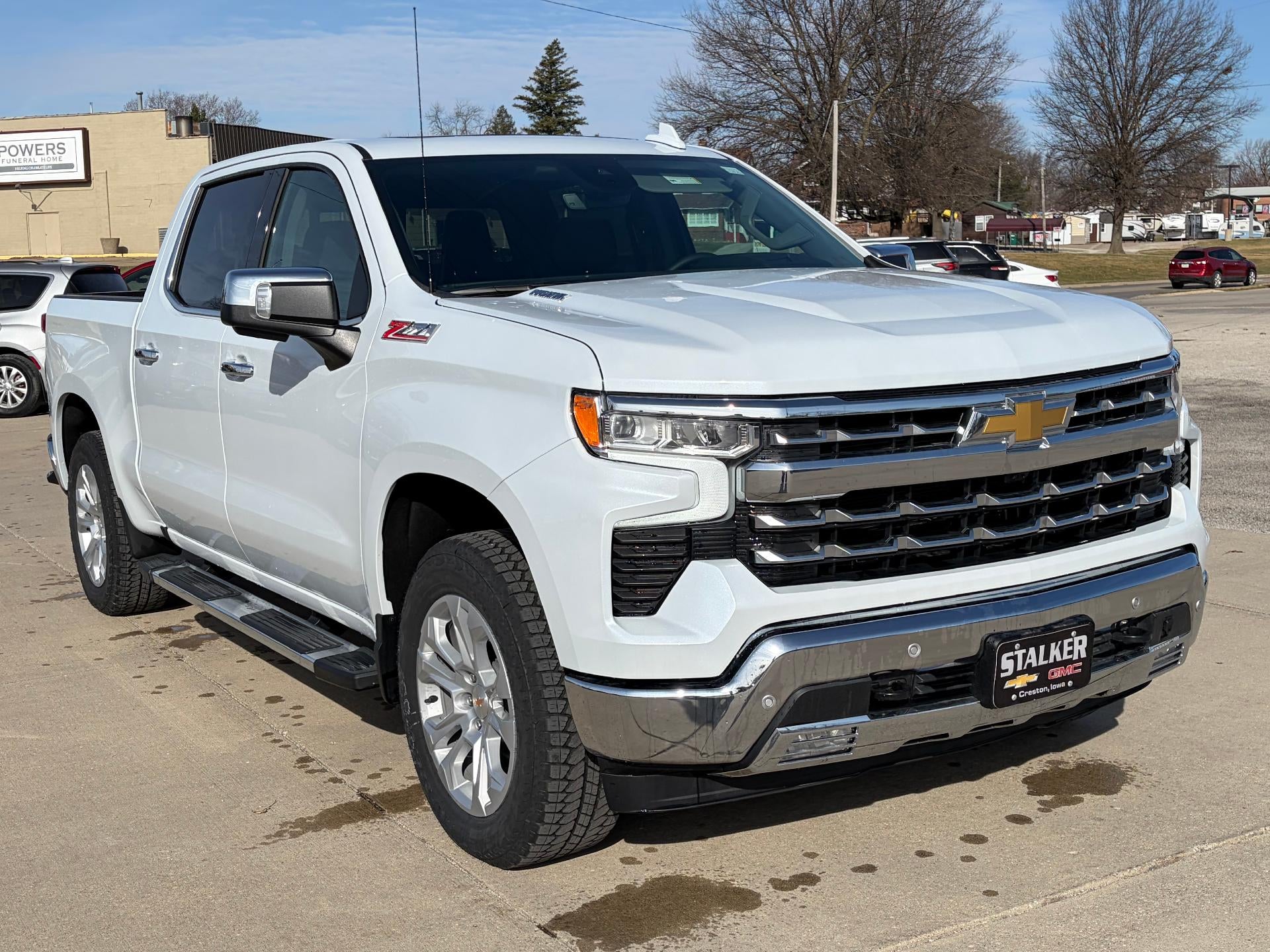 2026 Chevrolet Silverado 1500 LTZ in Polar White Tricoat — front three-quarter view